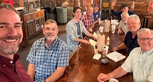 Healing Hearts men sharing a meal together during National Conference